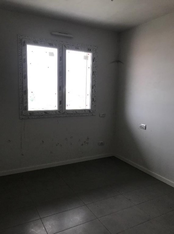 Appartamento con posto auto coperto e solaio a Pioltello (MI) - LOTTO 115